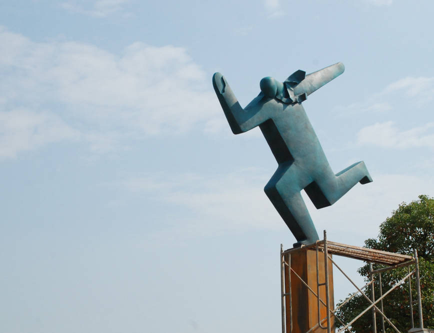 The figure against the sky