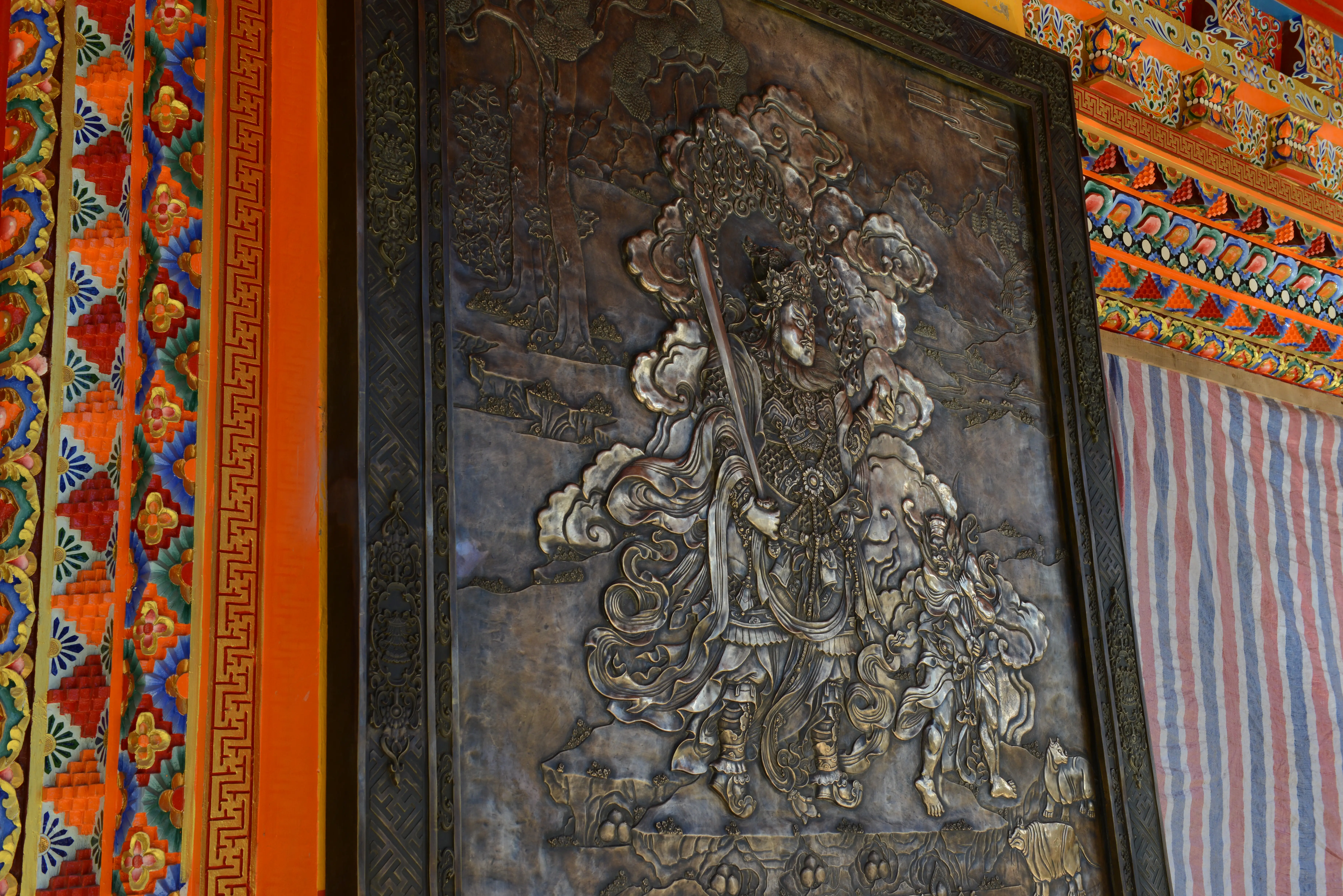 Four Heavenly Kings Reliefs at Tashi Triling — Another relief panel