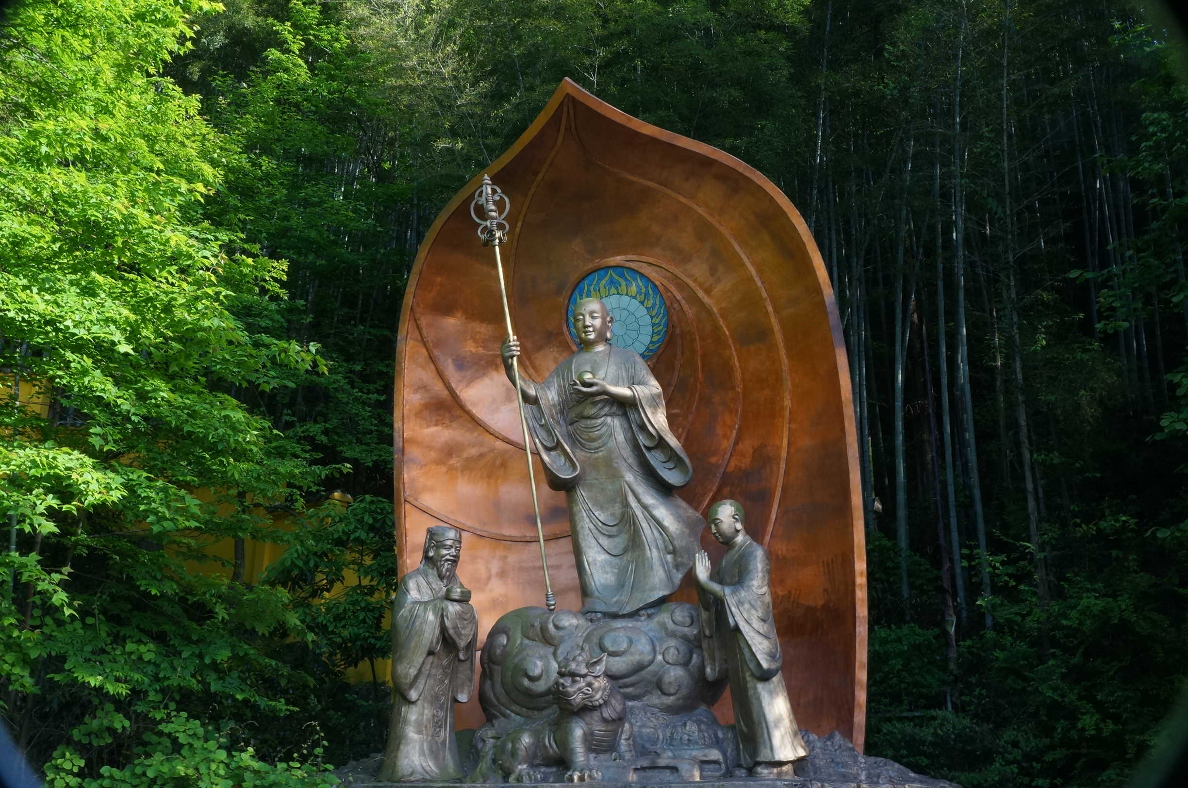 Land of the Kasaya — The figures and robe-shaped backdrop