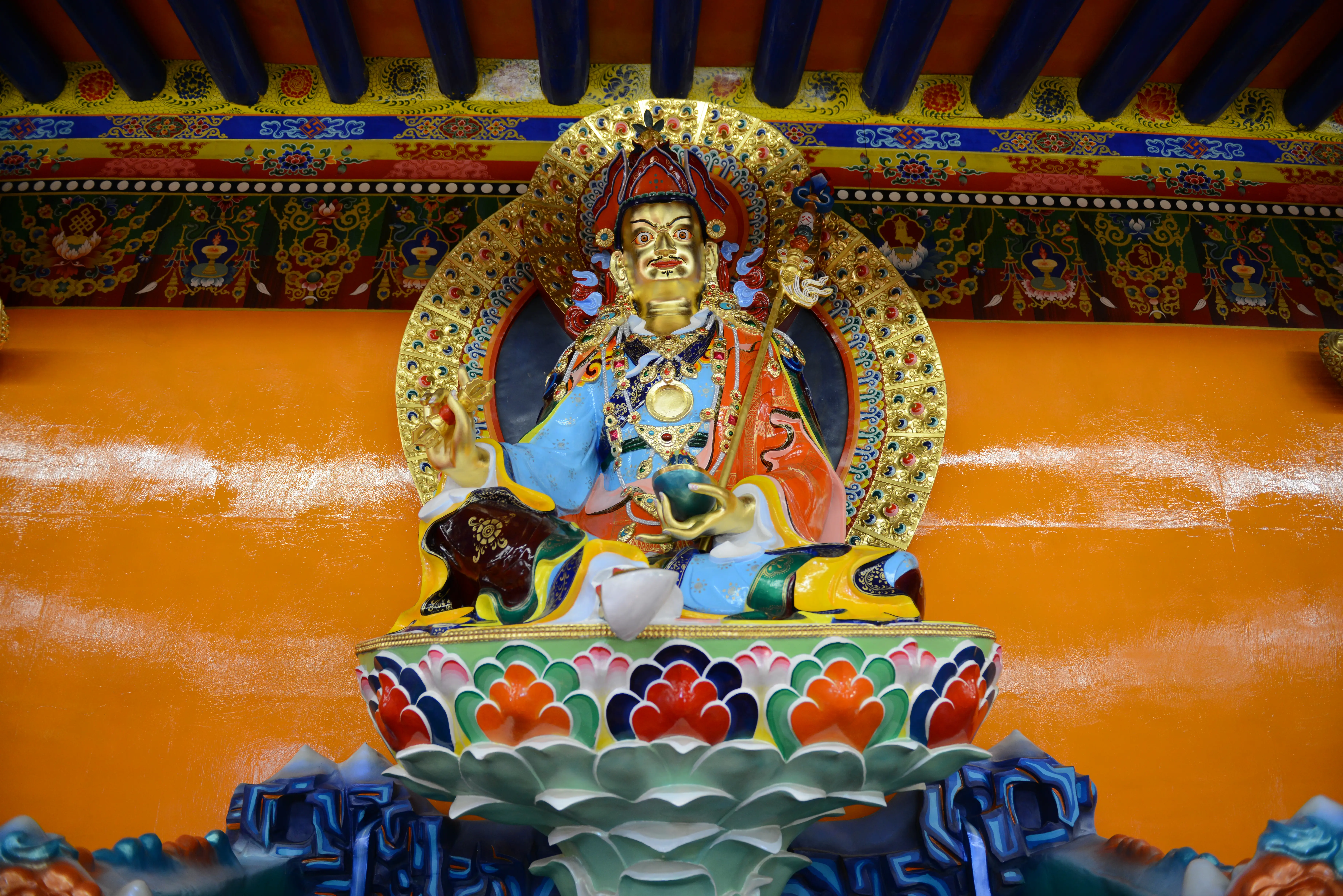 Guru Rinpoche Statue — A polychrome figure in the temple interior