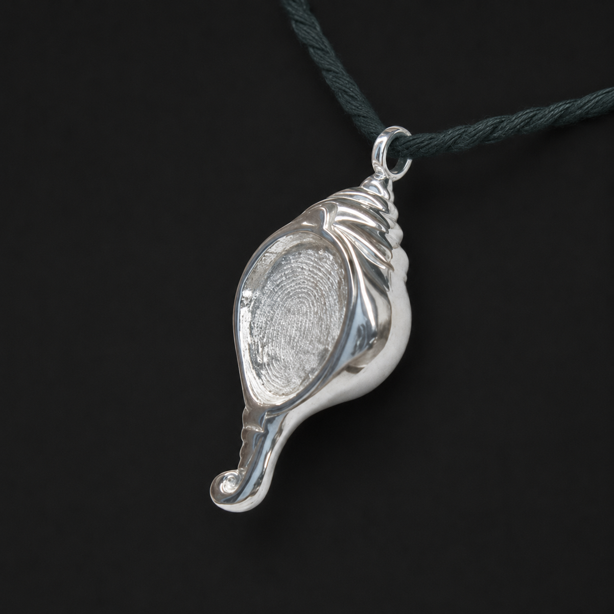 Conch Pendant — The reverse of the pendant