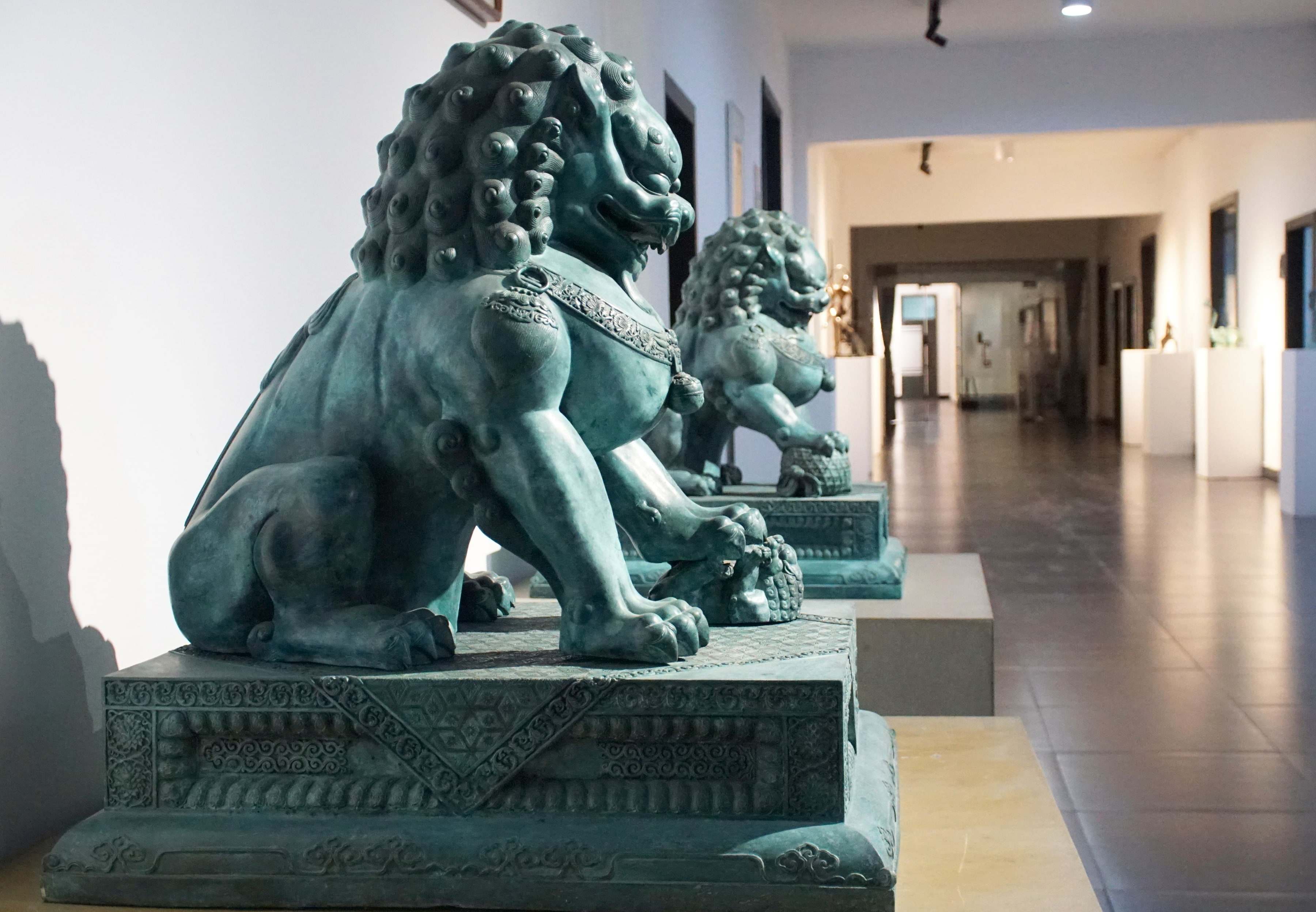 Palace Lion Pair — The pair in the gallery