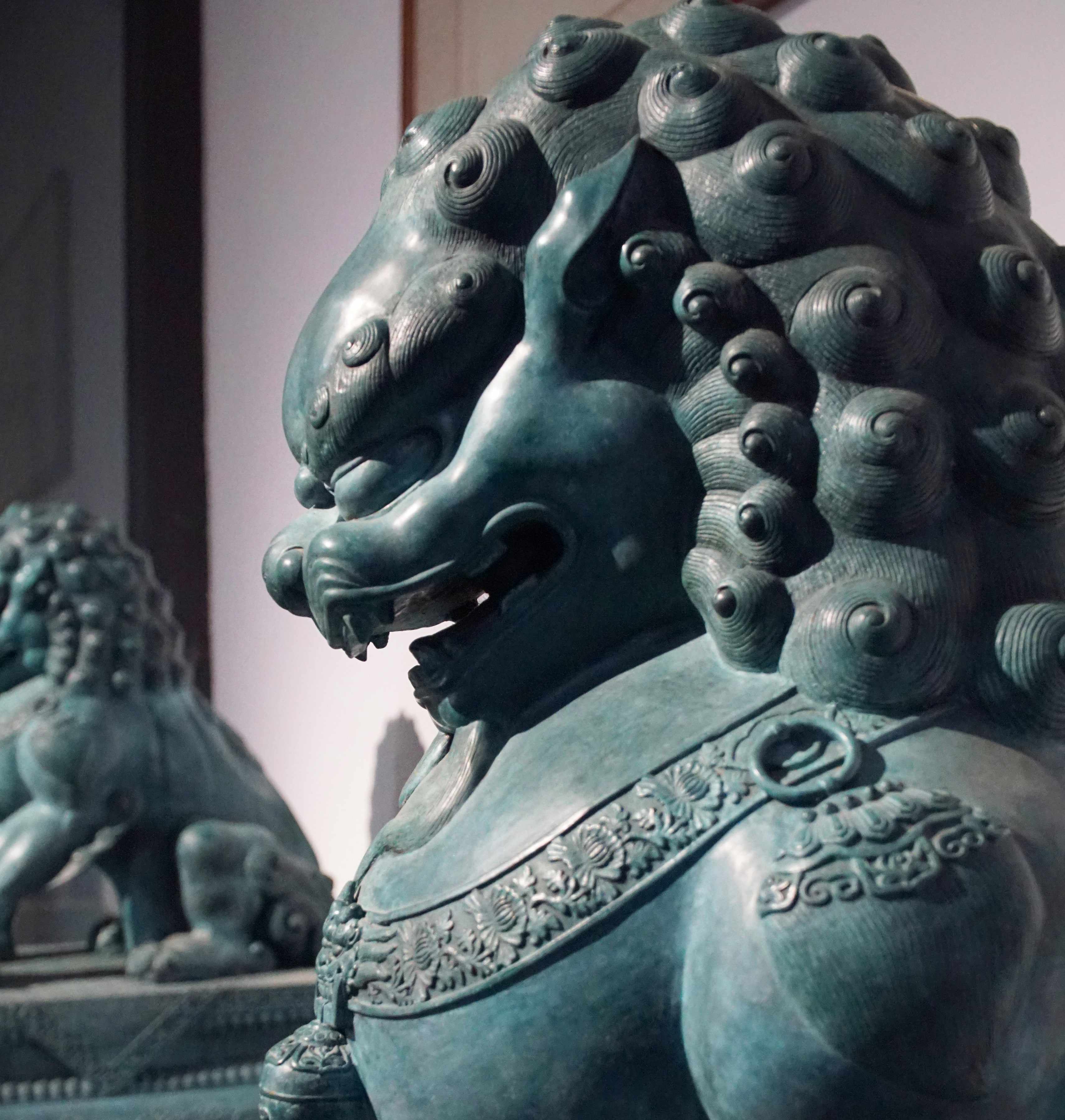 Palace Lion Pair — Head and mane detail