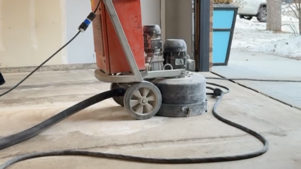Concrete Diamond Grinder Close-up garage floor coating prep in Bismarck ND.