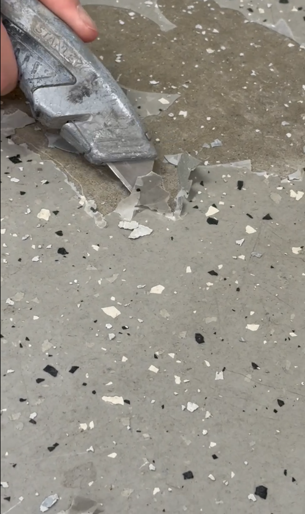 DIY epoxy floor peeling up with a knife, unprofessionally prepped and installed