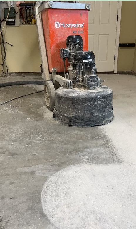 Diamond grinding concrete to create the proper surface profile for coating adhesion