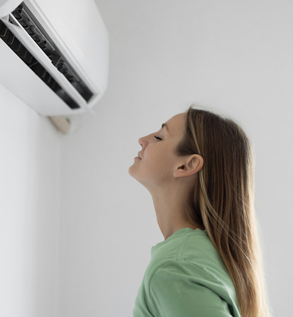 woman enjoying ac