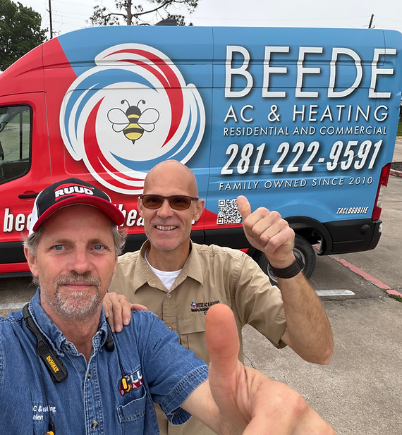 Two men smiling and giving thumbs up in front of a blue and red Beede AC & Heating service van with company phone number and logo.