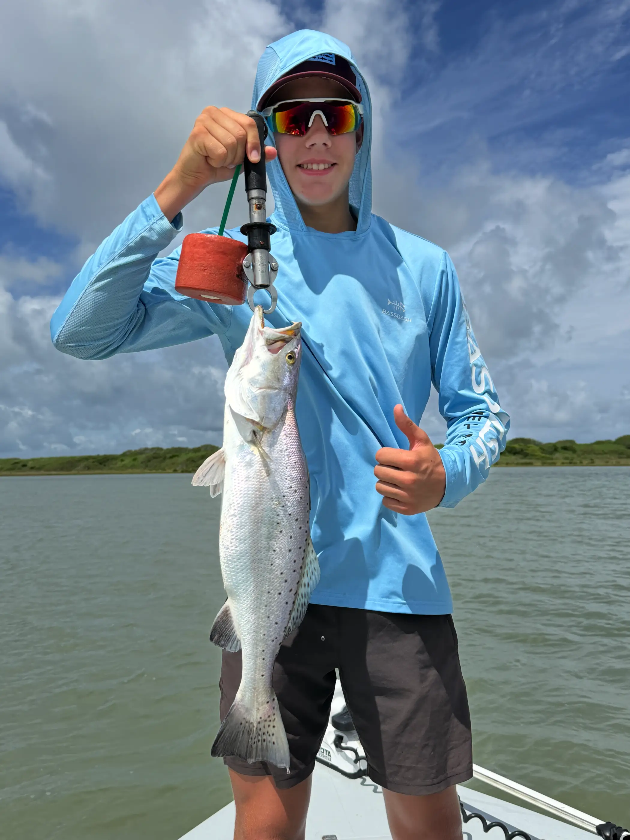 Youth fishing charter group at Redfish Bay Marina in Aransas Pass