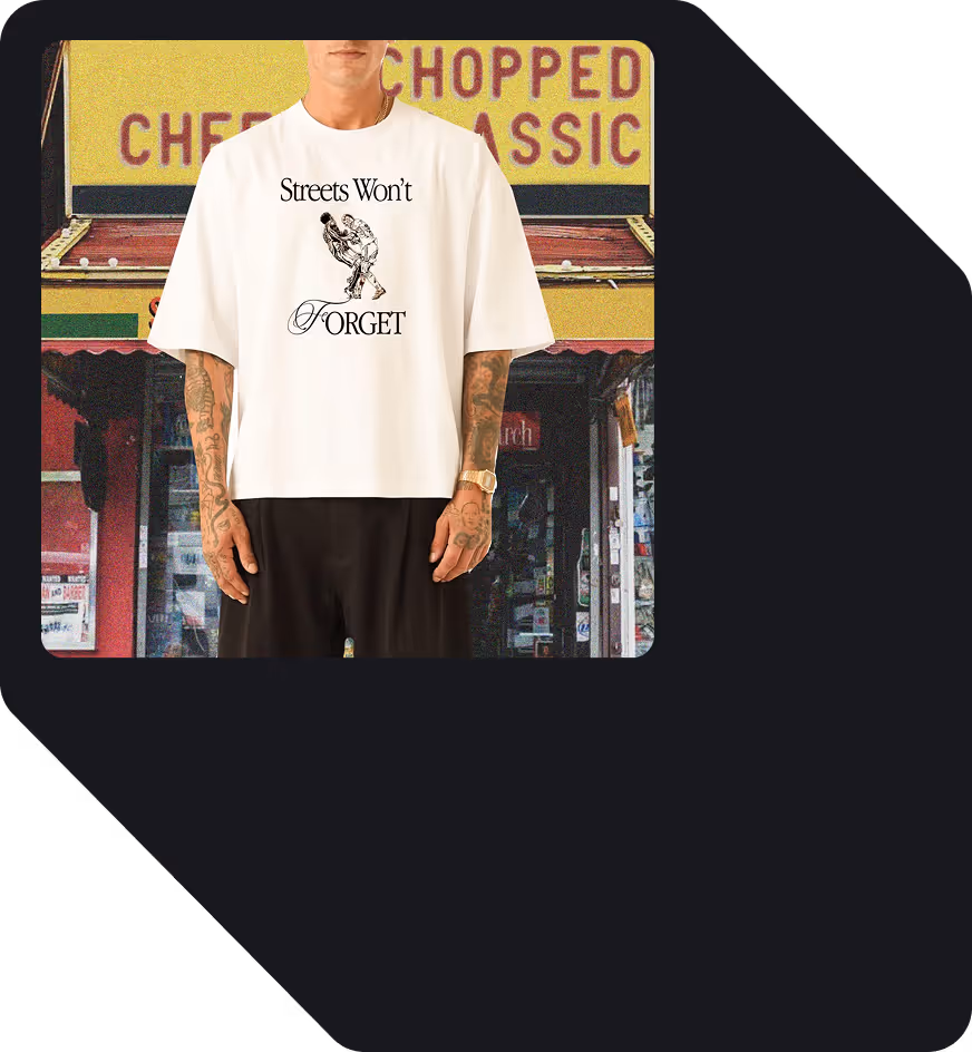 Man wearing white shirt with text 'Streets Won't Forget' and dancing figures printed on front.