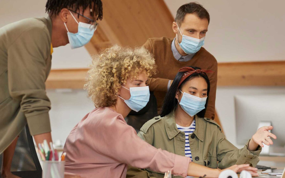 Employees participating in an updated workplace training program