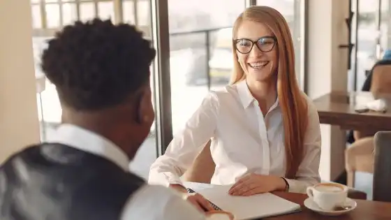Hiring team reviewing candidates and common recruiting challenges