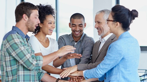 Compensation consultants reviewing pay strategy and market data