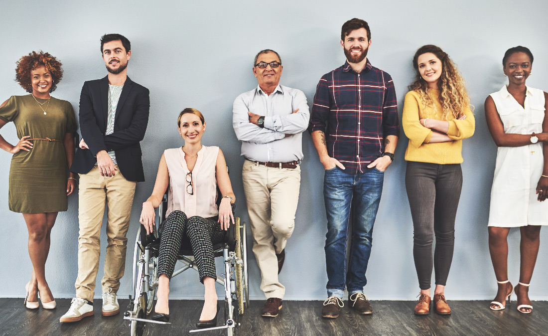 Team members collaborating to build a strong workplace culture
