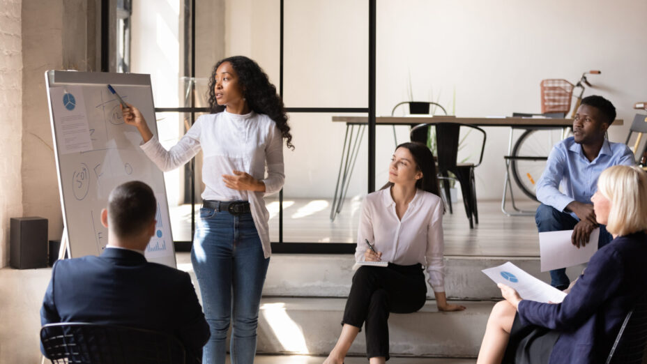Instructor facilitating an in-person workplace training session
