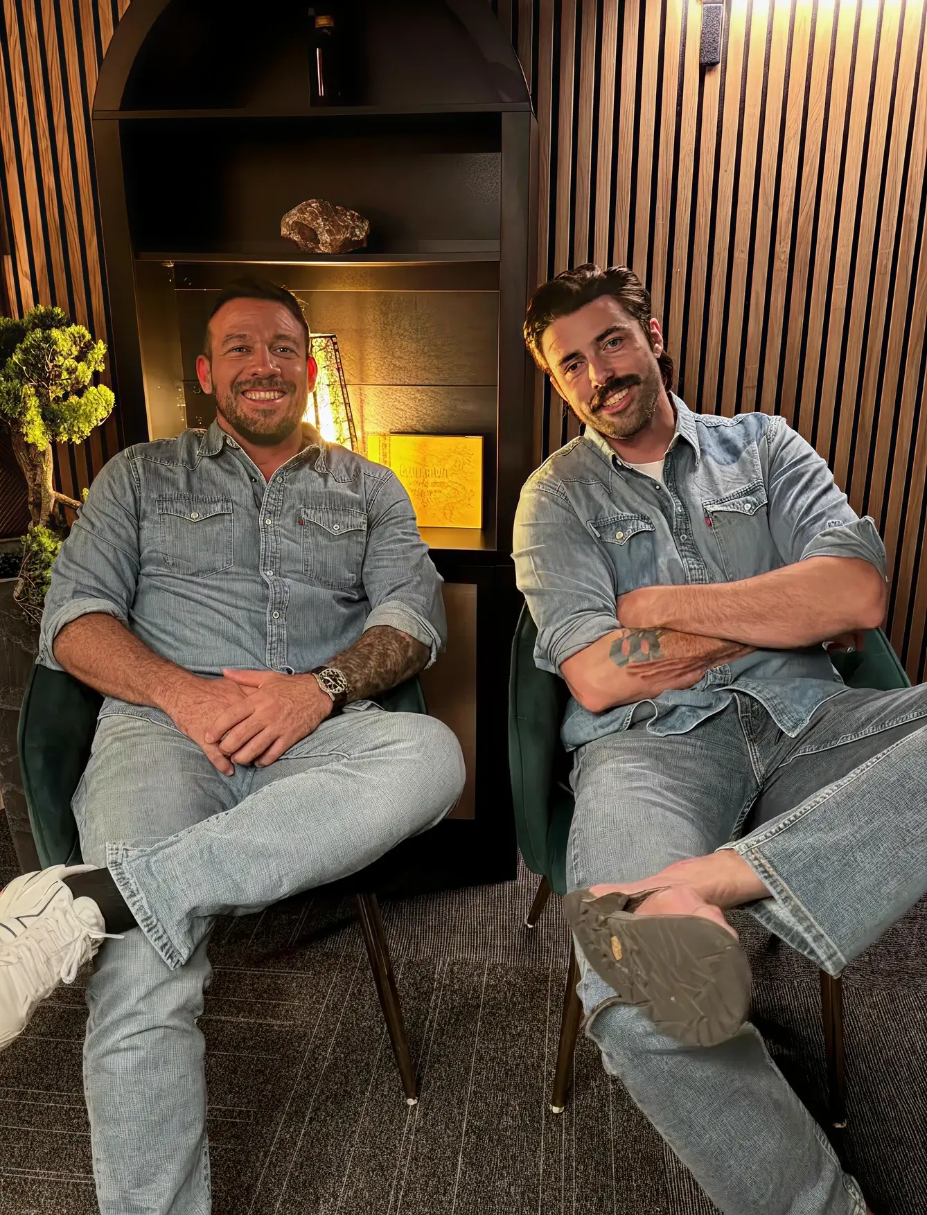 Shawn and Ian Carroll sitting side by side