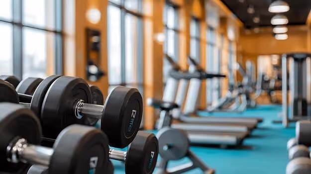Modern Luxfit gym interior with training floor and equipment.