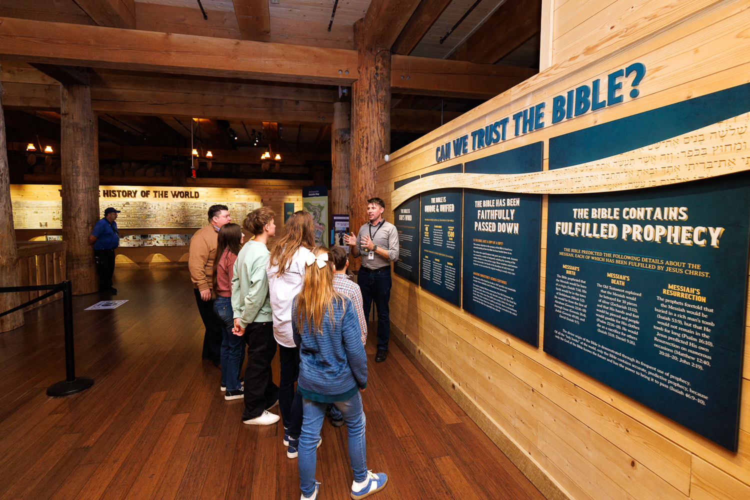 An Inspire guide explains the reliability of Scripture during a guided tour at the Ark Encounter's Can We Trust the Bible? exhibit.