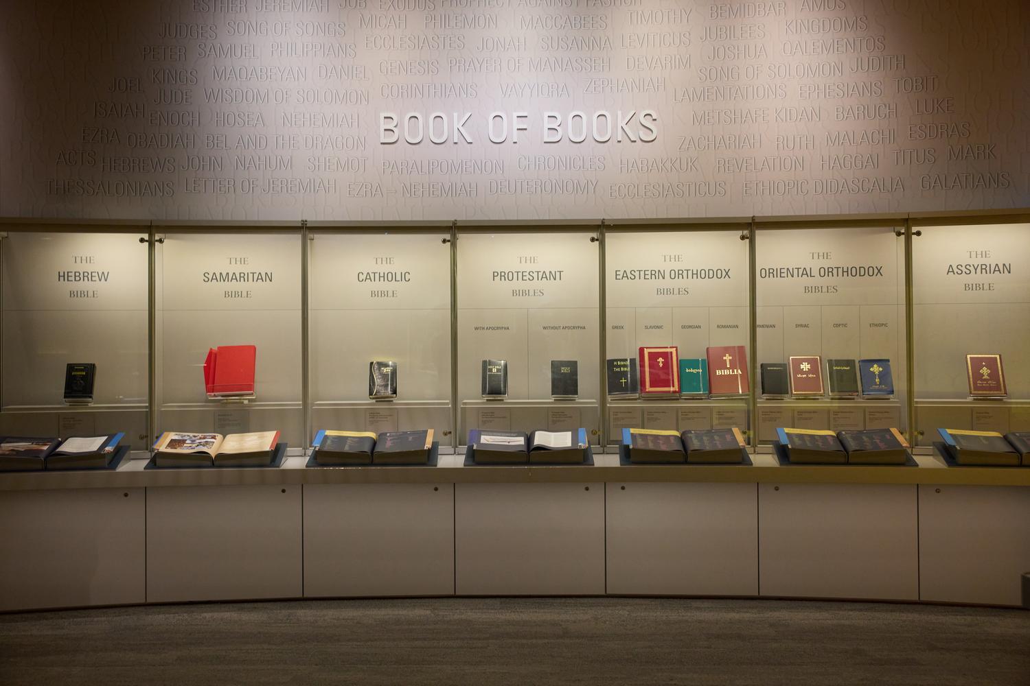 The "Book of Books" exhibit at the Museum of the Bible displays Hebrew, Samaritan, Catholic, Protestant, Eastern Orthodox, Oriental Orthodox, and Assyrian Bible traditions.