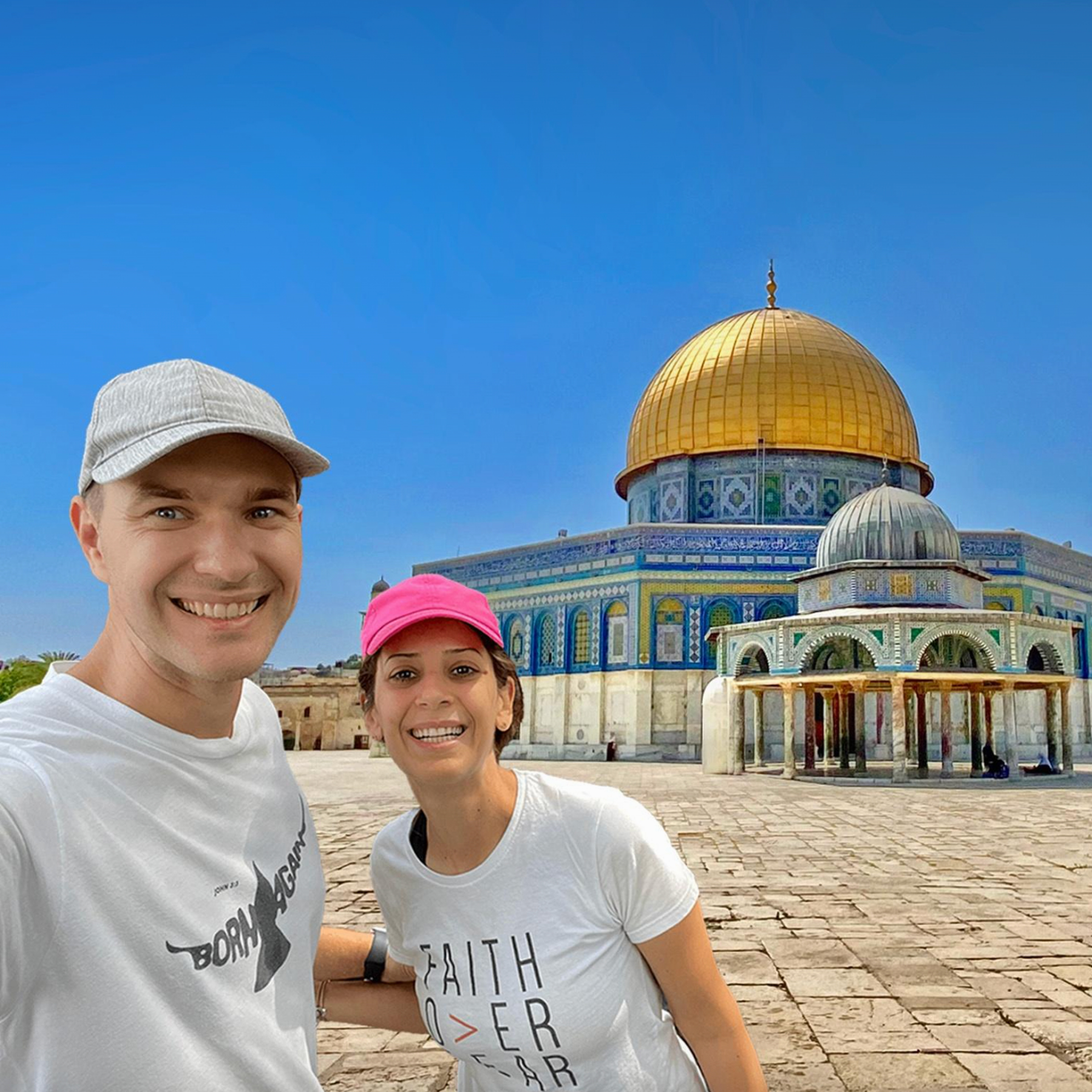 YouTube creators Sergio and Rhoda pose in front of the Dome of the Rock on the Temple Mount in Jerusalem, Israel.