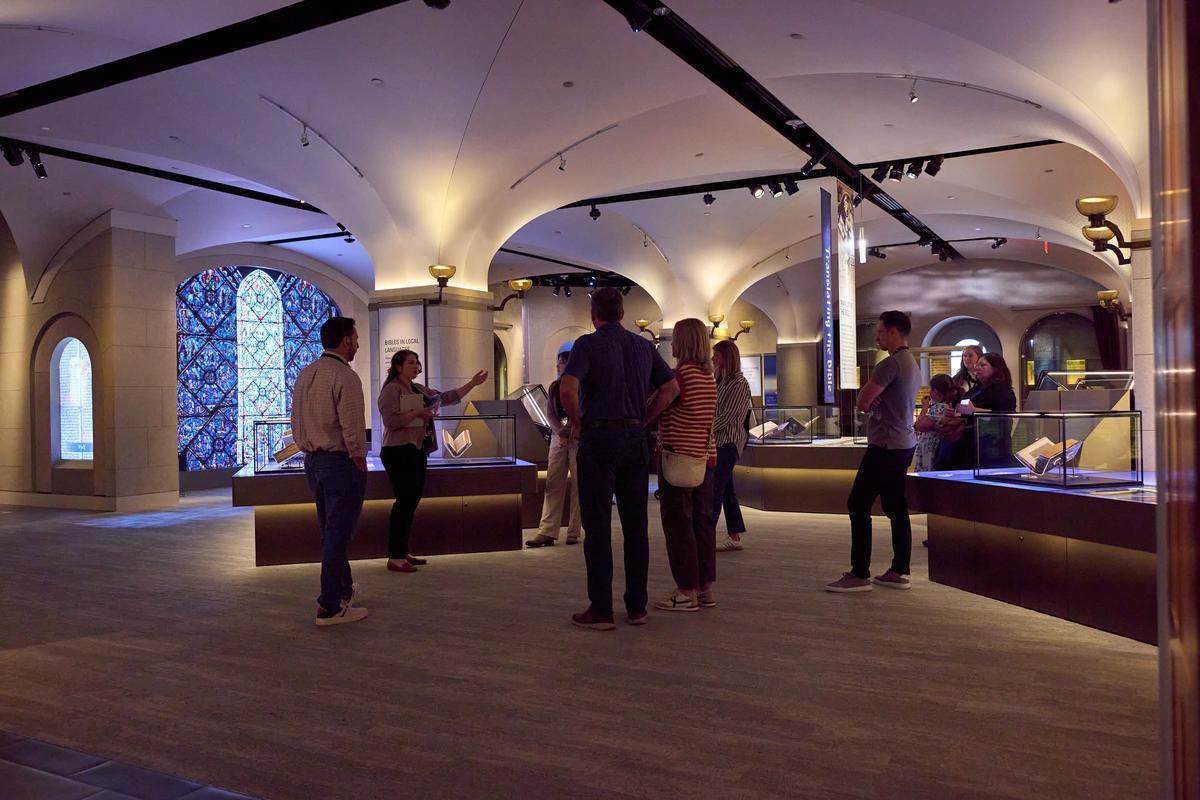An Inspire guide leads guests through the Museum of the Bible in Washington, D.C., exploring the history, narrative, and impact of God's Word.