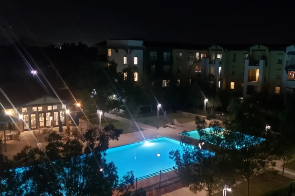 Pool and outdoor area at night