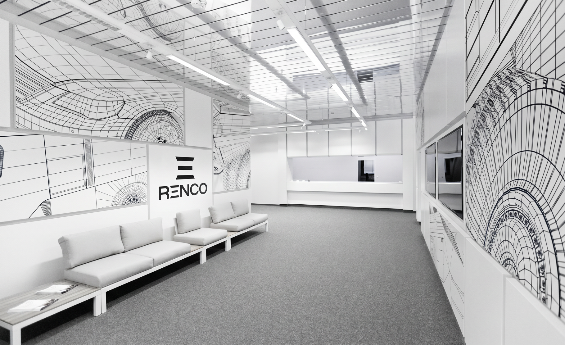 renco GmbH office reception area in Cologne, featuring the renco logo and large-format EV engineering technical drawings on the walls