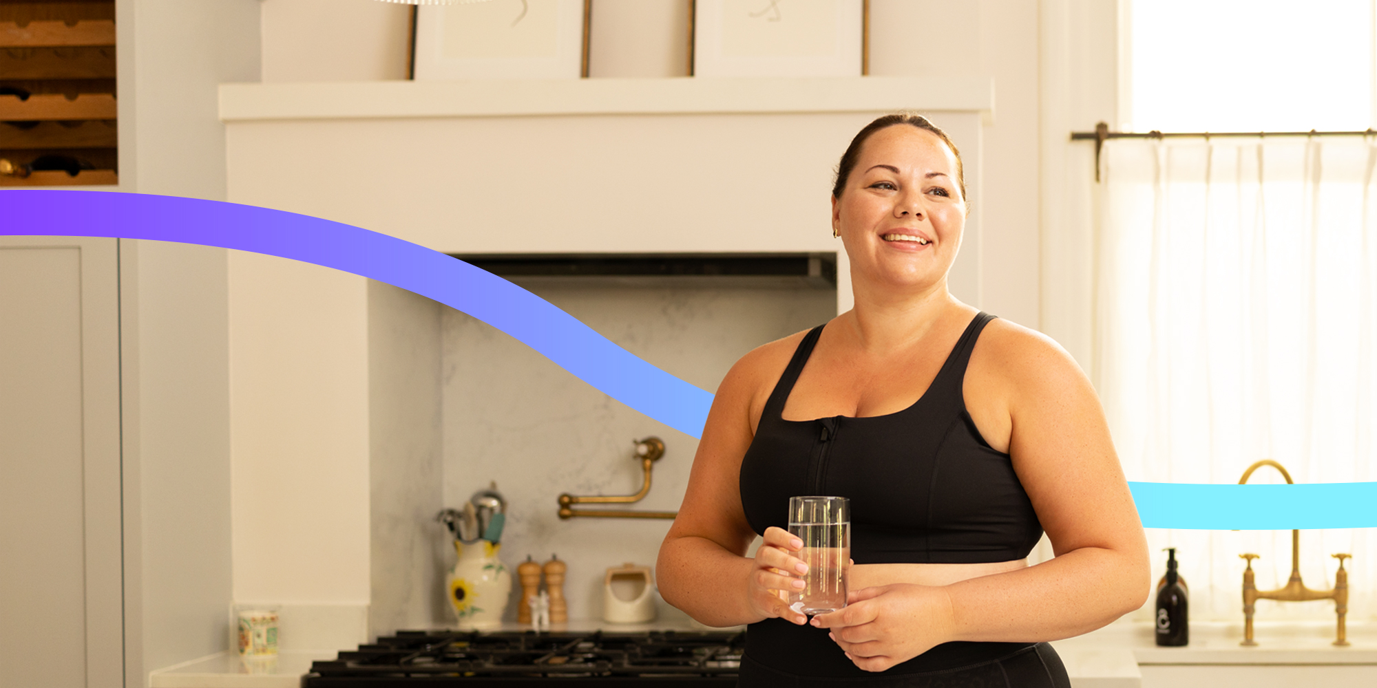 Happy woman in her kitchen.
