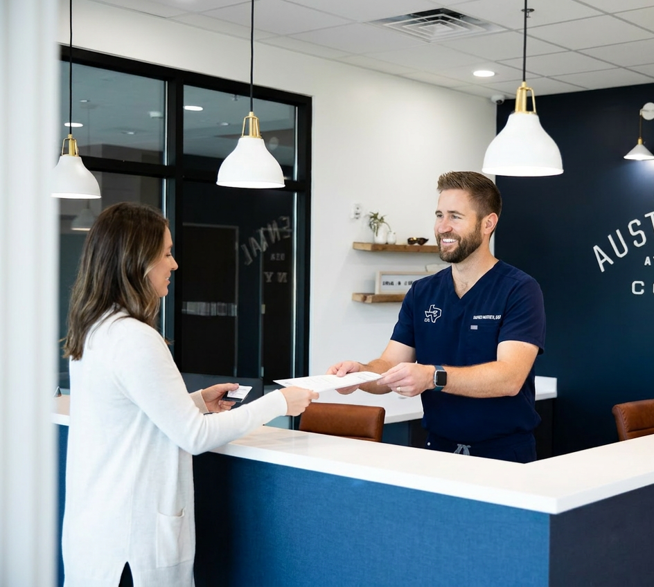 Interior of a modern dental office reception area with contemporary lighting