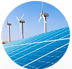 Solar panels in the foreground with three wind turbines in the background under a clear blue sky.