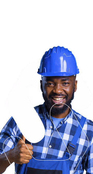 Smiling construction worker in blue helmet and plaid shirt giving thumbs up.