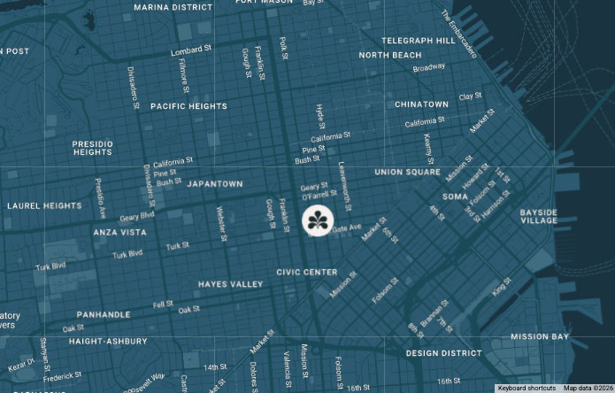 Map of central San Francisco neighborhoods including Marina District, Pacific Heights, Japantown, Union Square, Chinatown, SOMA, Civic Center, Haight-Ashbury, and Design District, with street names and a central clover icon.