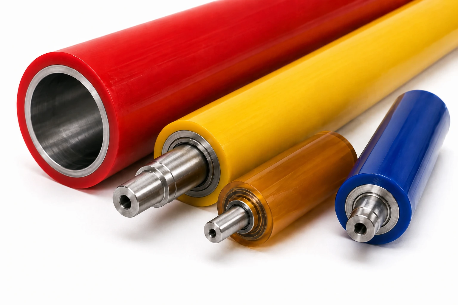 Quatre rouleaux industriels recouverts de polyuréthane coulé