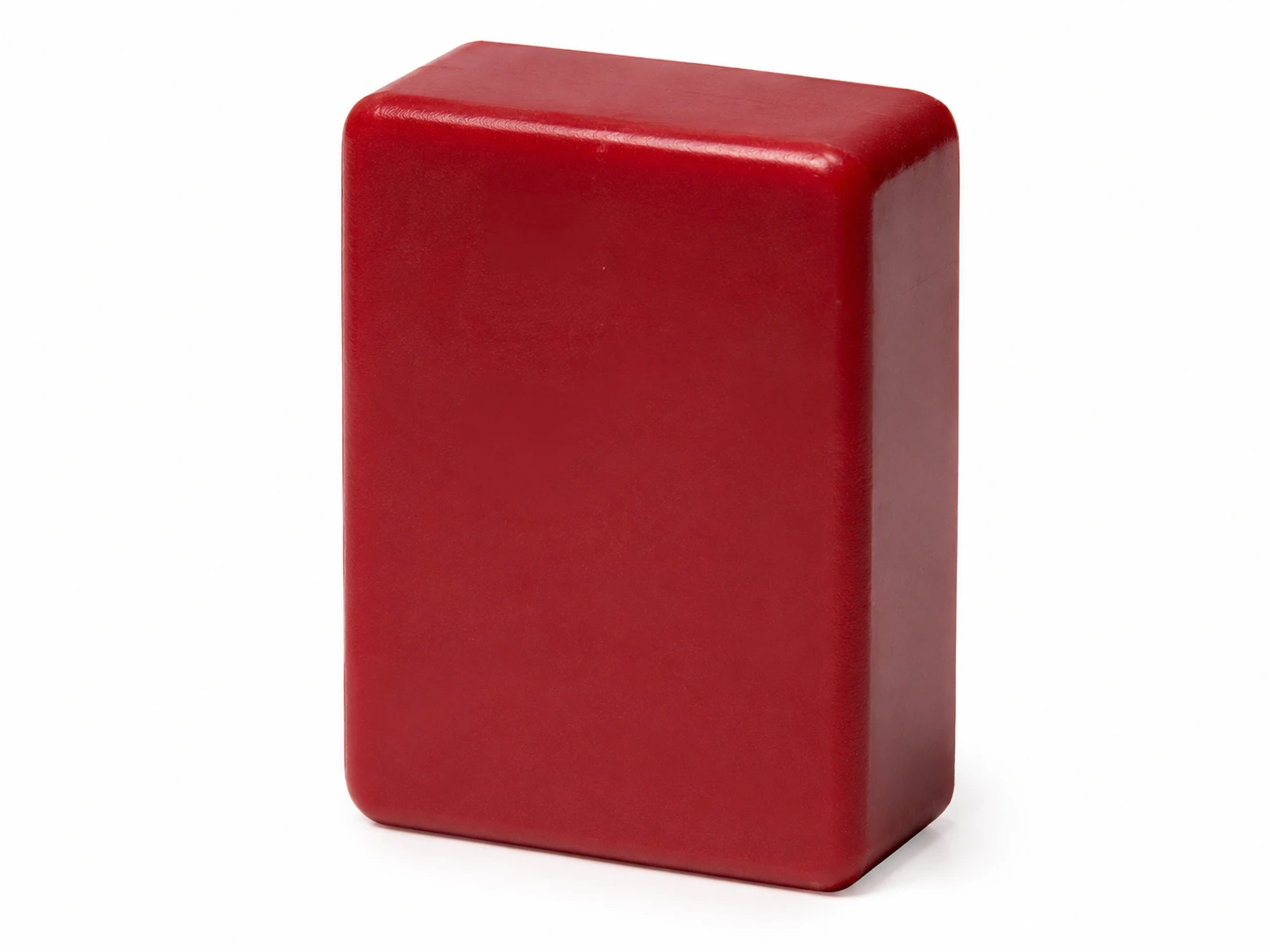 Bloc amortisseur rectangulaire en polyuréthane rouge à coins arrondis, dureté choisie selon l'énergie à absorber