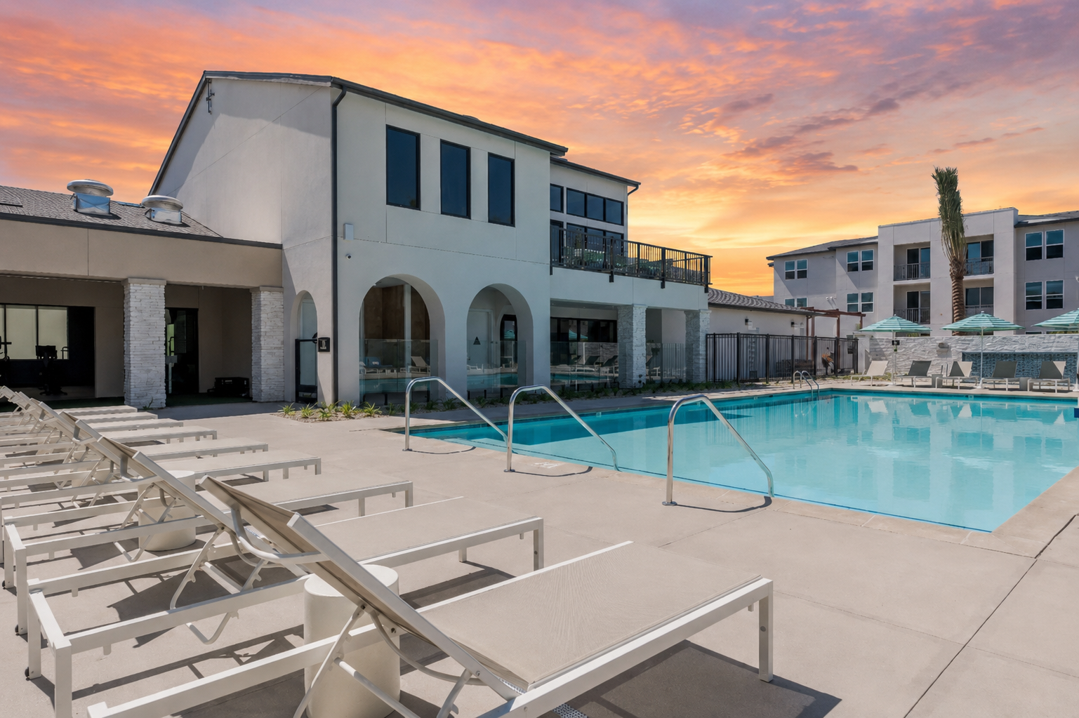 Swimming pool with lounge chairs