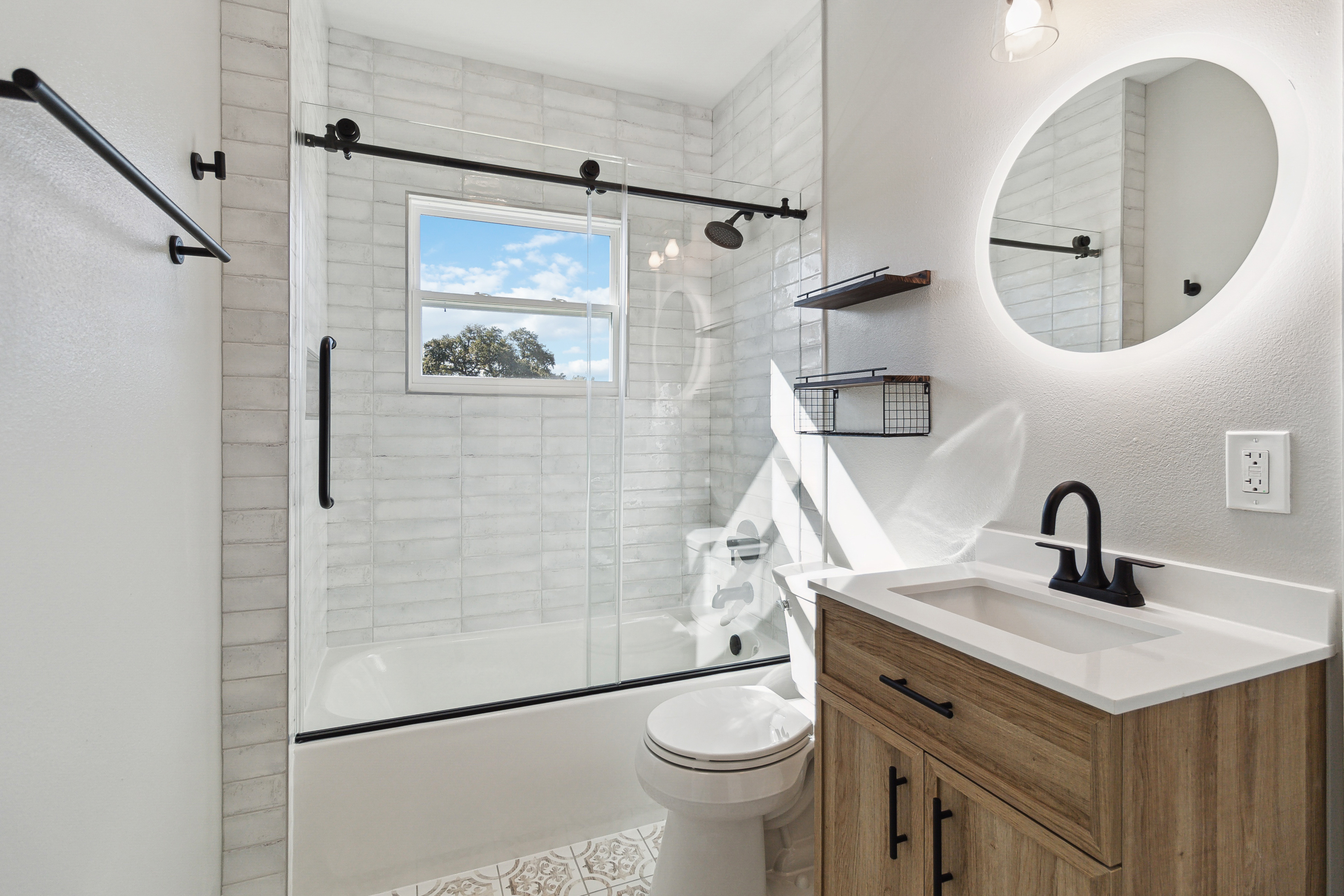 Modern remodeled bathroom by Coastal Builders Associates