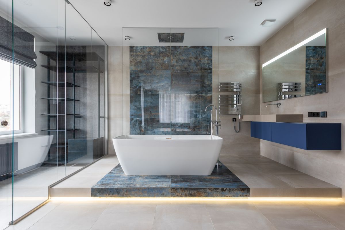 Freestanding soaking bathtub in a modern bathroom remodel