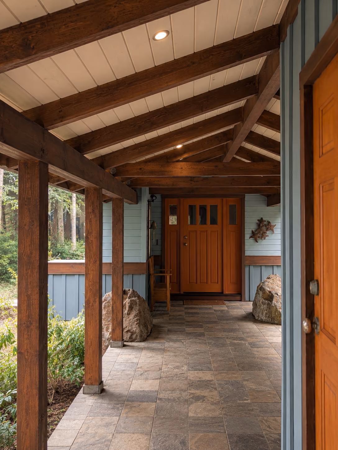 Rainstone Developments contemporary custom home in west coast style with natural textures of wood and stone