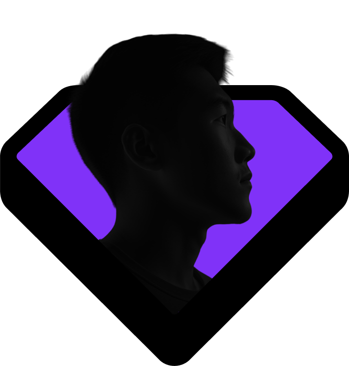Silhouette of a man's side profile against a purple diamond-shaped background.