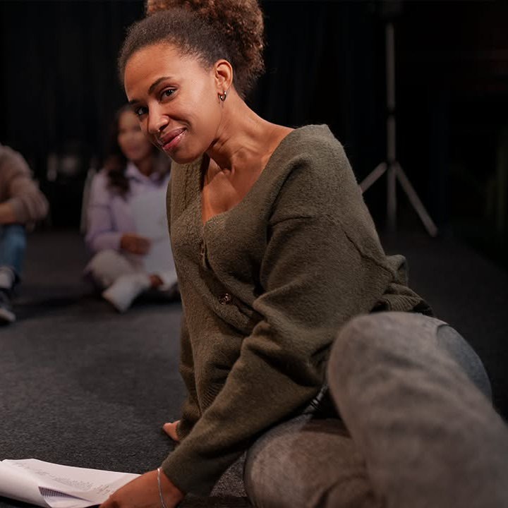 image of dance instructor teaching a class