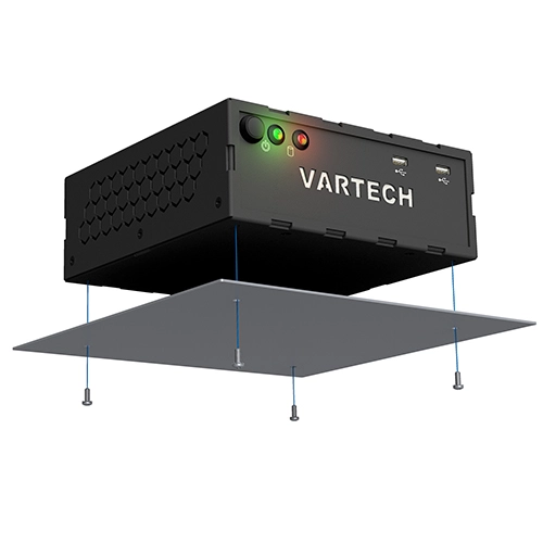 Black VARTECH device with indicator lights, buttons, and USB port suspended above a panel with screws.