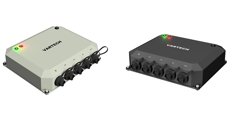 A pair of ToughCube IP67 industrial small form factor computers in black and light gray powder coated finishes