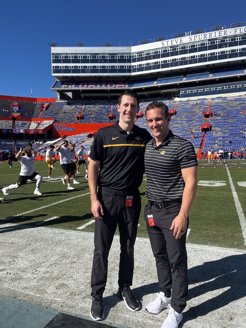 Dr. Kelly on the field at Florida with Mizzou