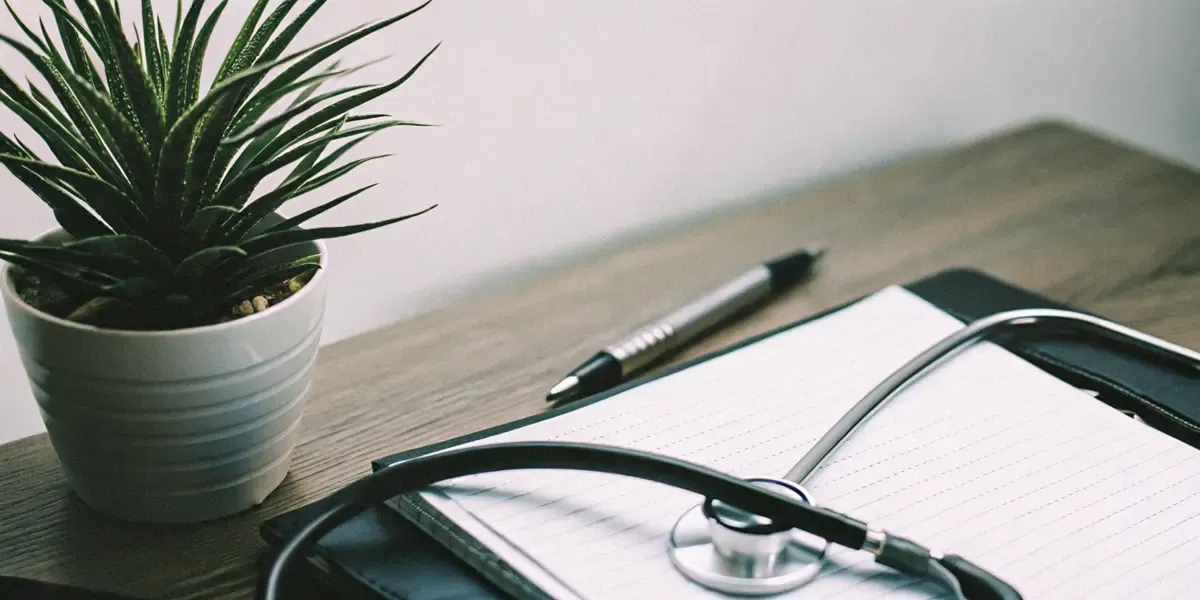 A professional desk setup representing detailed clinical documentation and professional psychological evaluations.