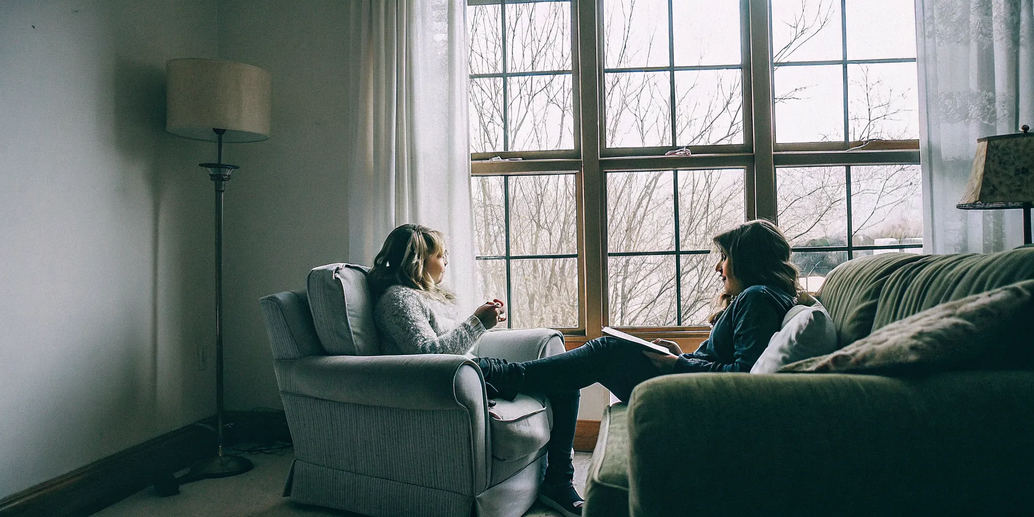 Parent and teenager discussing how to select a therapist together