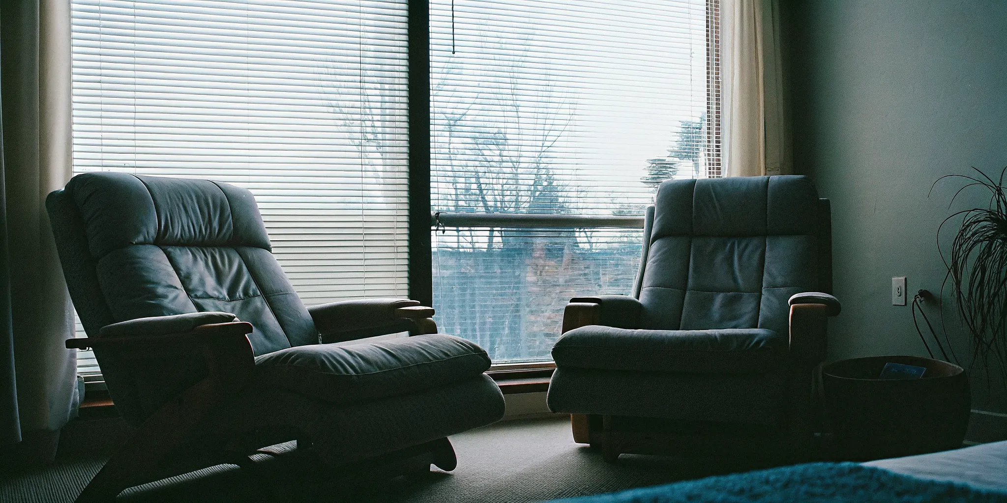 A warm and peaceful couples counseling room in Fairfax, Virginia with comfortable armchairs