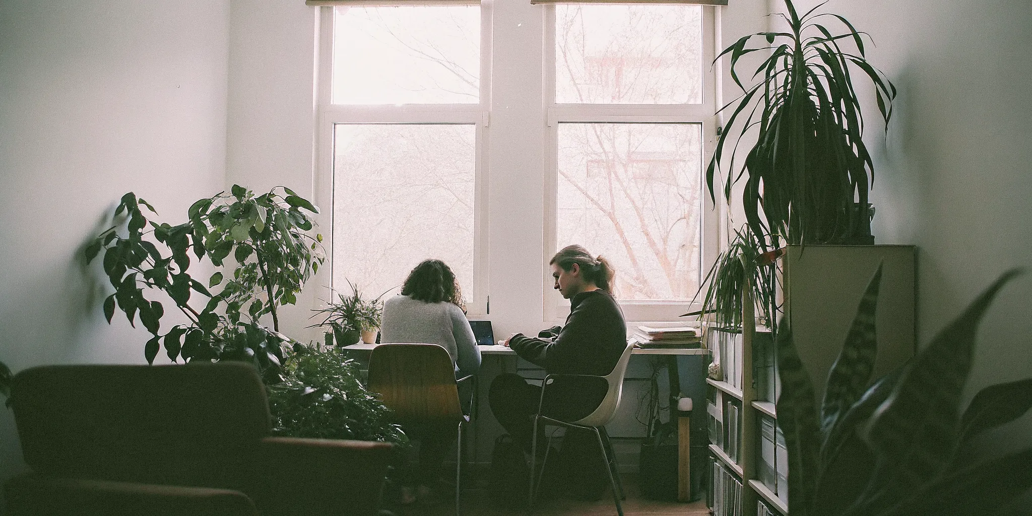 Licensed mental health clinician speaking with a client in a calm office