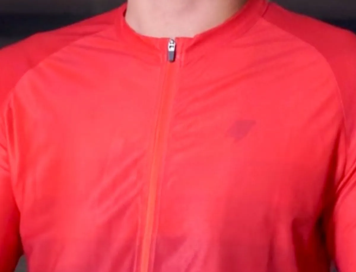 The Cuore x Strava Gran Fondo jersey used as a premium benchmark in this test. Clean print registration, structured fabric, and a proper full-length zipper. This is the bar the AliExpress jersey has to clear.