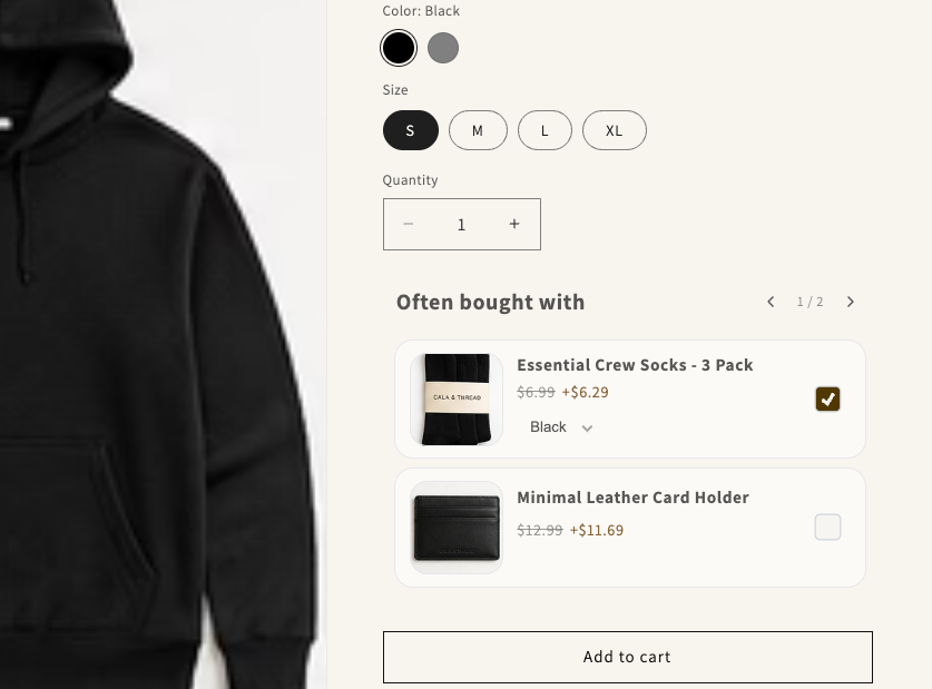 Online product page showing black classic cotton hoodie priced at $32.99 with size and add-ons options.