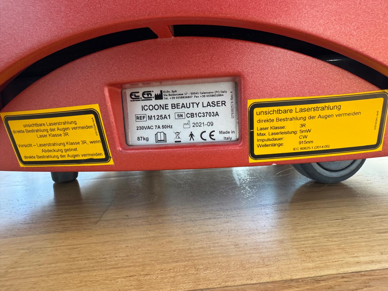 ICOONE Laser Beauty manufacturer label showing serial number CB1C3703A and production date September 2021